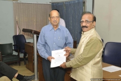 Dr R G Sharma Felicitating Dr R K Luthra on joining 80+ fraternity